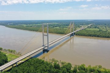 Aerial and Road Trip style views of the Audubon Bridge